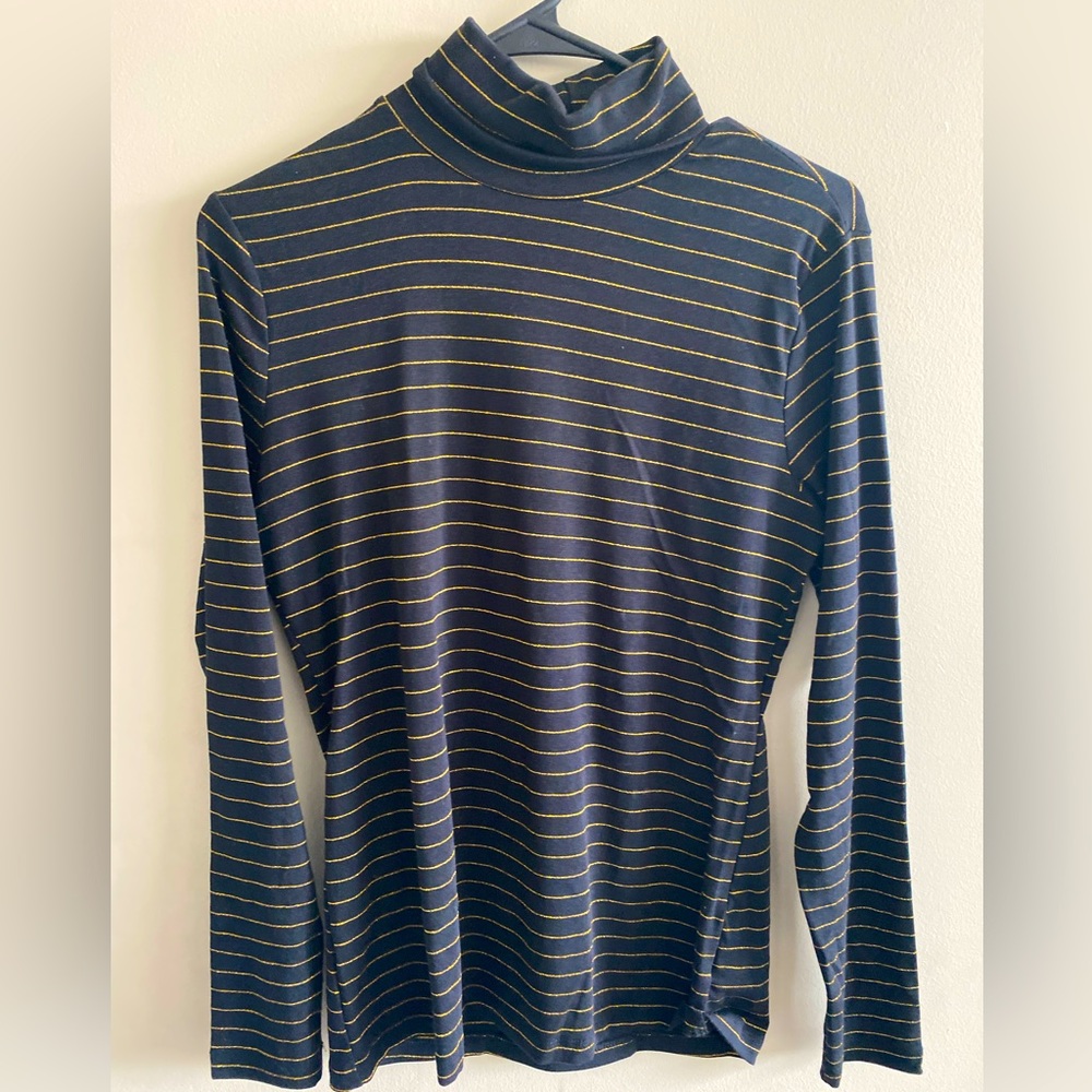 Never worn black and gold turtle neck